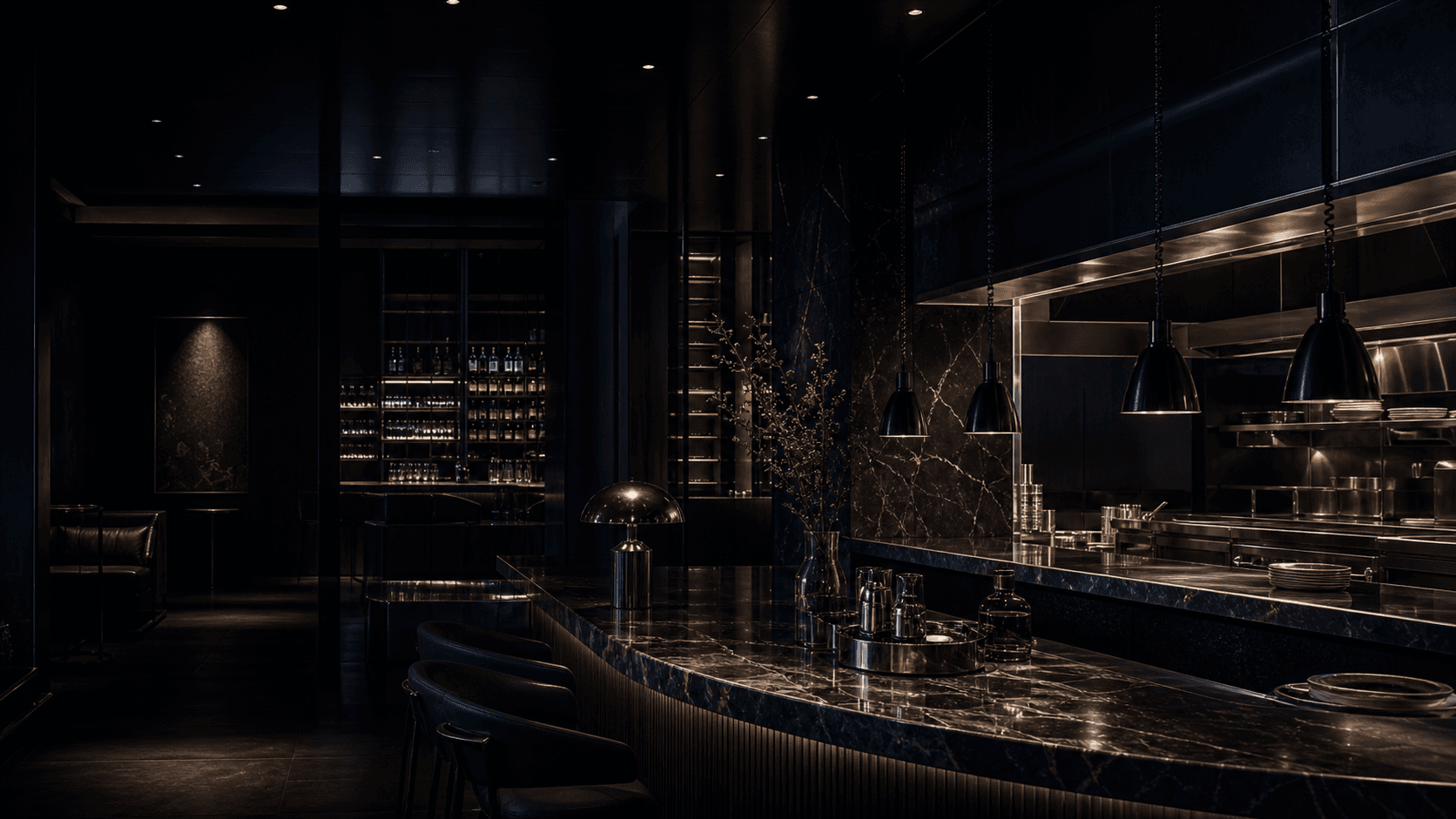 Dark luxury hospitality interior with marble, chef pass lighting, and bar details